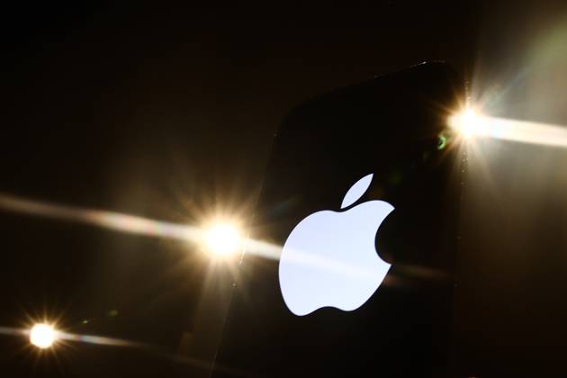 Popular Apps And IT Companies Photo Illustrations Lights and Apple logo displayed on a phone screen are seen in this illustration photo taken in Krakow, Poland on December 27, 2023. Krakow Poland Copyright: xJakubxPorzyckix originalFilename: porzycki-populara231227_np43N