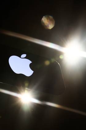 Popular Apps And IT Companies Photo Illustrations Lights and Apple logo displayed on a phone screen are seen in this illustration photo taken in Krakow, Poland on December 27, 2023. Krakow Poland Copyright: xJakubxPorzyckix originalFilename: porzycki-populara231227_npQlD