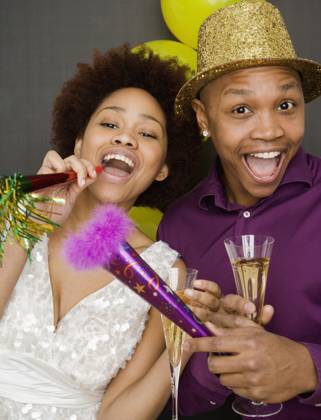 African couple in party hats on New Years Eve Jersey City, NJ, 21.12.2023, model released, TTBB_BLD065881.jpg, 20-24 years, 25-29 years, african ethnicity, afro, anticipation, black background, boyfriend, celebration, champagne, champagne flute, close up, color image, colored background, confidence, costume, decoration, dress, drinking, elegance, enjoying, entertainment, evening gown, excitement, festive, food and drink, front view, fun, girlfriend, glamour, gray, grinning, happy, hat, heterosexual couple, holding, holiday, looking at camera, man, mixed race person, mouth open, multi-ethnic group, new years eve, new years, noise maker, noise makers, party, party hat, partying, people, photography, portrait, posing, smiling, studio shot, tr Copyright: xJGI JamiexGrillx