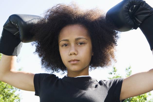 Serious teenage girl wearing boxing gloves Elk Grove, CA, USA, 21.12.2023, model released, TTBB_BLD099029.jpg, active, african-american ethnicity, aggression, arms raised, athletic, attitude, biceps, boxer, boxing gloves, brunette, childhood, close up, color image, competition, confidence, day, flexing, front view, head and shoulders, horizontal, looking at camera, low angle view, one person, outdoors, people, photography, portrait, posing, practicing, pride, rebellion, recreation, serious, sports, standing, strength, teenage girl, teenage girls, training, youth culture,, minority, minorities, gritaction, african, african american, african ethnicity, african-american, afro american, afro-american, aggressive, amusement, arm, bicep, black, Copyright: xDenisexCrewx
