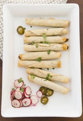 IMAGO Creative, Food, Taquitos Mexican taquitos on platter Jersey City, New Jersey, USA, 04.05.2012, TTBB_BLD103782.jpg, appetizer, color image, food and drink, freshness, garnish, high angle view, indoors, jalapeno, medium group of objects, mexican food, nobody, nourishing, nutrition, photography, platter, radish, rolled up, snack, still life, taquito, traditional cuisine, vertical, appetiser, color, colour, crockery, dish, dishware, food, fresh, group, health, healthy, high angle, hors doeuvre, indoor, inside, morsel, nourishment, nutritious, nutritive, refreshment, still-life, tableware, tidbit, vegetable, wholesome, Copyright: xJGI JamiexGrillx