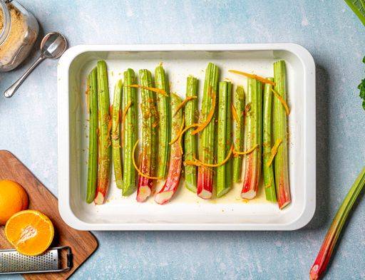A closeup shot of rhubarb stalks in a rectangle plate. Top view. 2469594 RECORD DATE NOT STATED