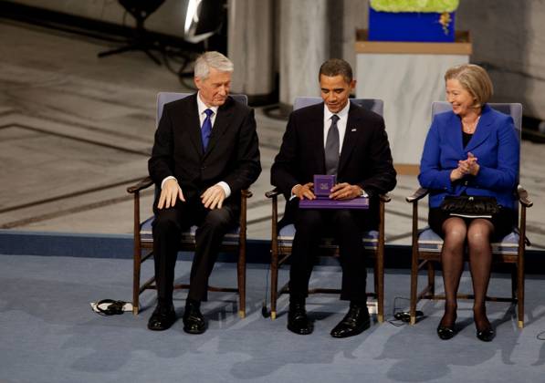 Accepting the Nobel Prize for Peace Oslo, Norway - December 10, 2009 -- United States President Barack Obama looks at the Nobel Prize medal during the Nobel Peace Prize ceremony in Raadhuset Main Hall at Oslo City Hall In Oslo, Norway, Thursday, December 10, 2009. .Mandatory Credit: Pete Souza - White House via CNP Oslo Norway EDITORIAL USE ONLY Copyright: xx P121009PS-0624 PetexSouzax cnpphotos022465