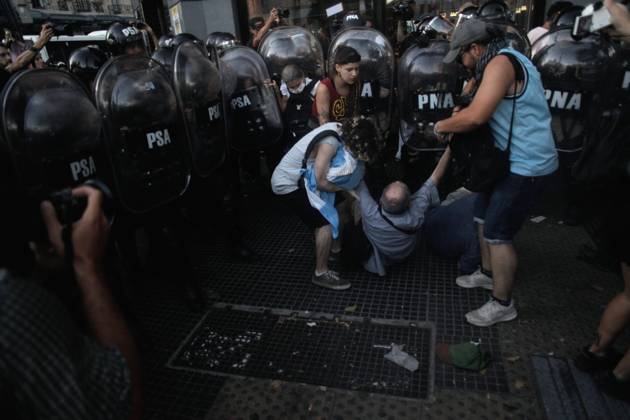 February 2, 2024, Buenos Aires, Federal Capital, Argentina: February 2, 2024, Buenos Aires, Argentina: The security agencies of the Argentine state strongly repressed demonstrators who were protesting in the vicinity of the nation s Congress in repudiation of the approval, in the chamber of deputies, of the controversial Omnibus Law of the newly elected president, Javier Milei. In the repression, older adults were beaten, run over, and sprayed with pepper spray. They also strongly detained a photographer. Buenos Aires Argentina - ZUMAa179 20240202_aap_a179_006 Copyright: xRobertoxAlmeidaxAveledox