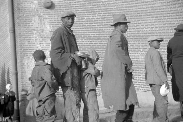African Americans in the lineup for food at mealtime in the flood refugee camp, Forrest City, Arkansas 3666436 African Americans in the lineup for food at mealtime in the flood refugee camp, Forrest City, Arkansas by Evans, Walker (1903-75); Private Collection; (add.info.: Photograph taken for the U.S. Resettlement Administration: a New Deal U.S. federal agency that, between April 1935 and December 1936, relocated struggling urban and rural families to communities planned by the federal government.). Copyright: xBridgemanxImagesx 3666436