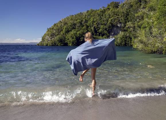 Jumping over waves Taupo Bay of Plenty New Zealand  Copyright: xSouthernxStockxImagesx 6016-19226145 ,model released, Symbolfoto
