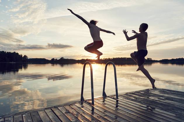 Boys jumping into lake , model released Copyright: xJohnerxImagesx , johner2290950.jpg 