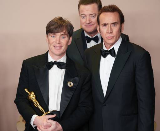 Cillian Murphy of Oppenheimer, celebrates backstage with his Oscar for Best Actor accompanied by fellow Academy Award winners including Brendan Fraser (C) and Nicolas Cage during at the 96th annual Academy Awards in Los Angeles, California, on Sunday, March 10, 2024. Since 1929, the Oscars have recognized excellence in cinematic achievements.  LAP20240310869 PATxBENIC