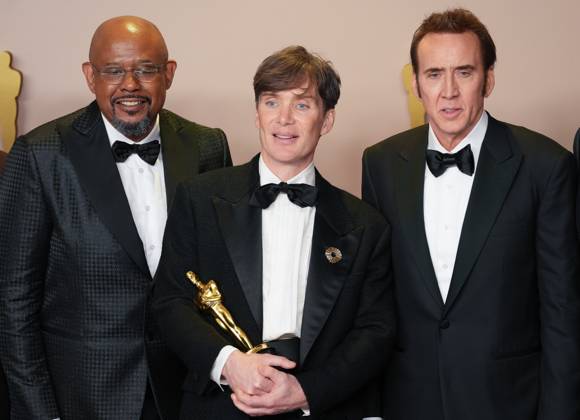 Cillian Murphy (C) of Oppenheimer, celebrates backstage with his Oscar for Best Actor accompanied by fellow Academy Award winners including Forest Whitaker and Nicolas Cage during at the 96th annual Academy Awards in Los Angeles, California, on Sunday, March 10, 2024. Since 1929, the Oscars have recognized excellence in cinematic achievements.  LAP20240310870 PATxBENIC