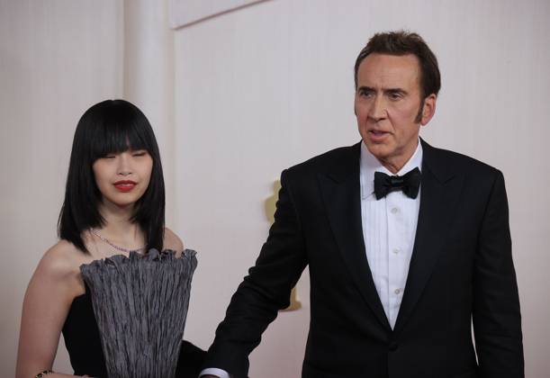 March 10, 2024, Hollywood, California, USA: Riko Shibata and Nicolas Cage on the red carpet of the 96th Annual Academy Awards on Sunday March 10, 2024 at the Dolby Theater in Hollywood, California. BURT HARRIS BNS PI Hollywood U.S - ZUMAp124 20240310_zaa_p124_272 Copyright: xBurtxHarrisx