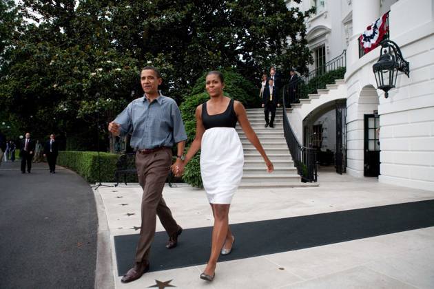 Obama1662.JPG.Washington, DC - July 4, 2009 -- United States President Barack Obama and First Lady Michelle Obama make their way from White House to shake hands with guests at a gathering of military families at the White House on July 4, 2009 in Washington, DC. President Obama is leaving tomorrow on a trip to Russia, Italy, and Ghana. .Digital Photo by Brendan Hoffman POOL-CNP-PHOTOlink. Washington DC USA EDITORIAL USE ONLY Copyright: xx BrendanxHoffman POOL-CNP-PHOTOlix phlphotos245953