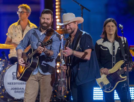 April 5, 2024, Austin, Tx, United States: American country rock band NEEDTOBREATHE with lead singer BEAR RINEHART, r, teams up with country pop singer JORDAN DAVIS performs at a taping of CMT Country Crossroads in front of the University of Texas Tower on April 5, 2024. Austin United States - ZUMAd150 20240405_znp_d150_028 Copyright: xBobxDaemmrichx