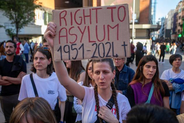 April 11, 2024, Madrid, Spain: A protester holds a placard during a rally. Concentration in the Plaza de Callao in Madrid called by social entities and associations of the migrant movement against the European Pact on Migration and Asylum, which is being debated and voted on these days in the European Parliament. Madrid Spain - ZUMAs197 20240411_aaa_s197_582 Copyright: xDavidxCanalesx