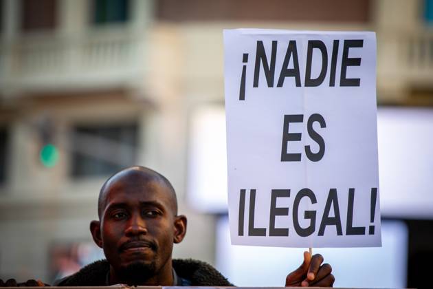 April 11, 2024, Madrid, Spain: A protester holds a placard during a rally. Concentration in the Plaza de Callao in Madrid called by social entities and associations of the migrant movement against the European Pact on Migration and Asylum, which is being debated and voted on these days in the European Parliament. Madrid Spain - ZUMAs197 20240411_aaa_s197_588 Copyright: xDavidxCanalesx