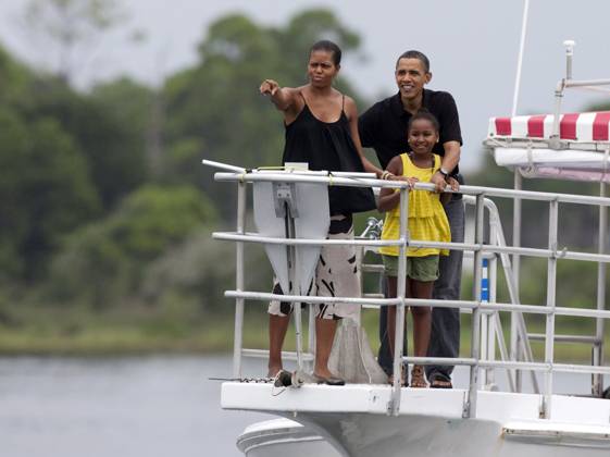 United States President Barack Obama, first lady Michelle Obama and daughter Sasha tour St. Andrews Bay on the Bay Point Lady, Sunday, August 15, 2010 In Panama City Beach, Florida. The First Family is visiting the area to help promote tourism and check up on cleanup efforts from the aftermath of the Deepwater Horizon Oil spill. .Digital Photo by Mark Wallheiser Pool-CNP-PHOTOlink. EDITORIAL USE ONLY Copyright: xx MarkxWallheiser Pool-CNP-PHOTOlink.netx phlphotos336560
