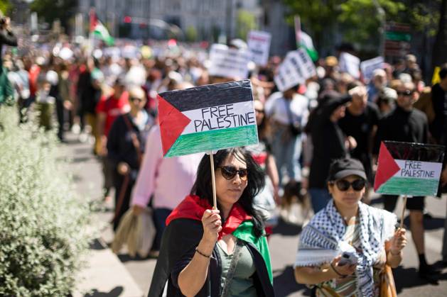 April 21, 2024, Madrid, Spain: A protester holds a placard in the colours of the Palestine flag that reads Free Palestine, during a demonstration in solidarity with the Palestinian people. Protesters march around the main streets of Madrid, under the slogan Let s stop the genocide in Palestine , demanding the Spanish government stop the arms trade with Israel. Madrid Spain - ZUMAs197 20240421_aaa_s197_029 Copyright: xLuisxSotox