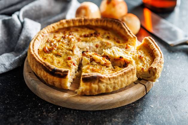 Traditional french pie. Quiche lorraine on kitchen table. Traditional french pie. Quiche lorraine on the kitchen table. Copyright: xZoonar.com JirixHERAx 21402298