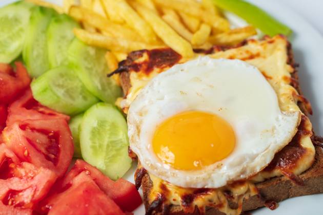 Breakfast. French cuisine. Croque madame sandwich close up on the table. Breakfast. French cuisine. Croque madame sandwich close up on the table. High quality photo Copyright: xwww.ercansenkaya.com RECORD DATE NOT STATED