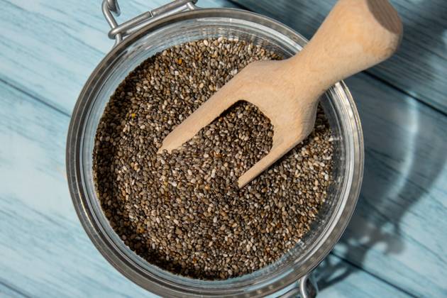 Chia seeds in glass jar. Healthy superfood rich in Omega 3 fatty acids. Dry healthy natural ingredient. Chia grains are falling Chia seeds in glass jar. Healthy superfood rich in Omega 3 fatty acids. Dry healthy natural ingredient. Chia grains are falling. Vegetarian food Copyright: x RECORD DATE NOT STATED