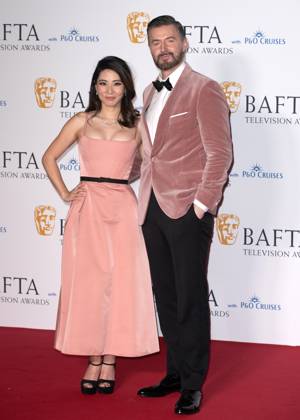 Jing Lusi and Richard Armitage attends the BAFTA Television Awards with P&O Cruises, at the Royal Festival Hall in London, England. UK. Sunday 12th May 2024 - Copyright: xJamesxWarrenx FP_BAFTA_TV_Awards_Press_Room_052