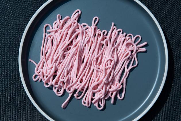 pink tarama pasta on a gray plate squeezed out of a cooking bag,creative texture pink tarama pasta on a gray plate squeezed out of a cooking bag, creative texture. High quality photo Copyright: x RECORD DATE NOT STATED