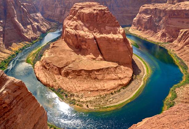 Page, Arizona, United States of America - June 7, 2024: View over the famous Horseshoe Bend a horseshoe-shaped bend of the Colorado River, located near the town of Page in the state of Arizona, USA
