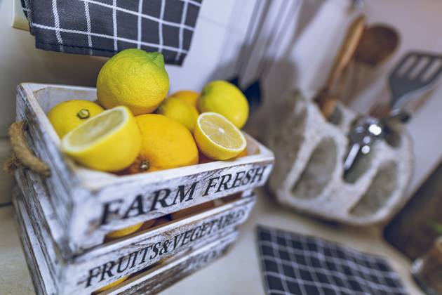 Kitchen Interior. Selective Focus on a Box with Fresh Ripe Lemons. Tasty Citrus Fruits for Lemonade. Home Life. Healthy Organic Nutrition.. Ripe Fresh Lemons on Kitchen ,model released, Symbolfoto
