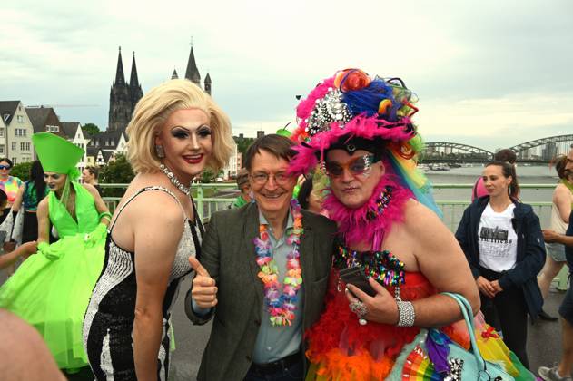 Politician Karl Lauterbach SPD , Federal Minister of Health as a participant in the Christopher Street Day CSD in Cologne Over 200 groups of lesbians and gays took part in the parade with this years motto For Human Rights - Many Together Strong They demonstrated for more social acceptance and legal equality for gays, lesbians, transgender a