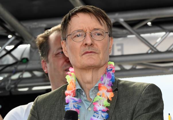 Politician Karl Lauterbach SPD , Federal Minister of Health as a participant in the Christopher Street Day CSD in Cologne Over 200 groups of lesbians and gays took part in the parade with this years motto For Human Rights - Many Together Strong They demonstrated for more social acceptance and legal equality for gays, lesbians, transgender a