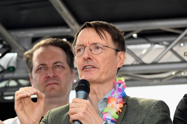 Politician Karl Lauterbach SPD , Federal Minister of Health as a participant in the Christopher Street Day CSD in Cologne Over 200 groups of lesbians and gays took part in the parade with this years motto For Human Rights - Many Together Strong They demonstrated for more social acceptance and legal equality for gays, lesbians, transgender a