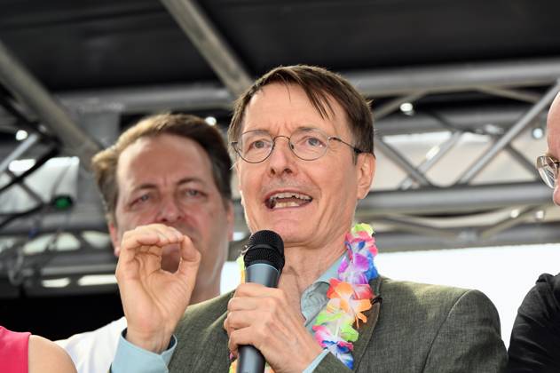 Politician Karl Lauterbach SPD , Federal Minister of Health as a participant in the Christopher Street Day CSD in Cologne Over 200 groups of lesbians and gays took part in the parade with this years motto For Human Rights - Many Together Strong They demonstrated for more social acceptance and legal equality for gays, lesbians, transgender a