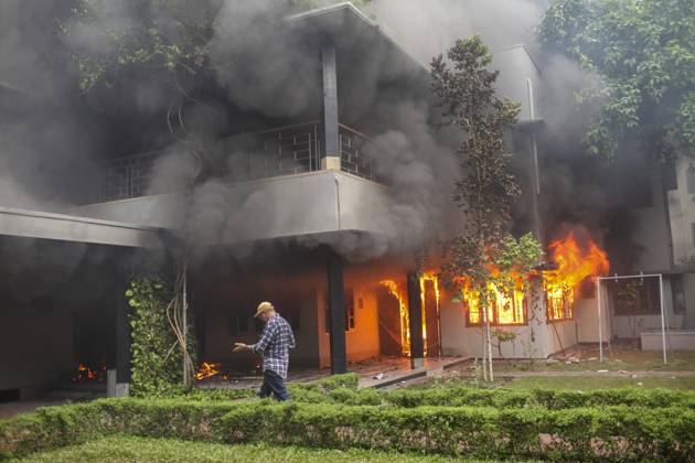 August 5, 2024, Dhaka, Dhaka, Bangladesh: The Bangabandhu Memorial Museum is set on fire by anti-government protestors in Dhaka on August 5, 2024. Protests in Bangladesh that began as student-led demonstrations against government hiring rules in July culminated on August 5, in the prime minister fleeing and the military announcing it would form an interim government. Dhaka Bangladesh - ZUMAj163 20240805_zip_j163_029 Copyright: xAbuxSufianxJewelx