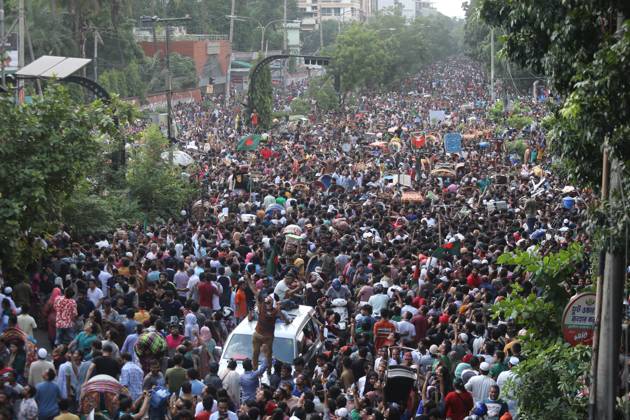 August 5, 2024, Dhaka, Wari, Bangladesh: Anti-government protestors celebrate in Shahbag near Dhaka university area in Dhaka on August 5, 2024. Protests in Bangladesh that began as student-led demonstrations against government hiring rules in July culminated on August 5, in the prime minister fleeing and the military announcing it would form an interim government.People gather to celebrate the fall of Bangladesh Prime Minister Sheikh Hasina after an intense clash between police, pro-government forces, and anti-Quota protesters in Dhaka, Bangladesh. Dhaka Bangladesh - ZUMAr336 20240805_zip_r336_035 Copyright: xHabiburxRahmanx