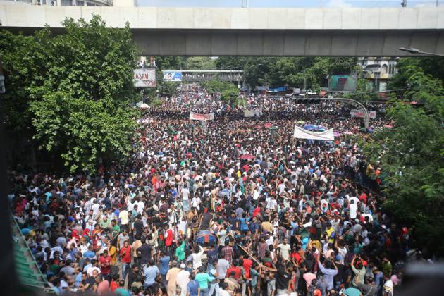 August 5, 2024, Dhaka, Wari, Bangladesh: Anti-government protestors celebrate in Shahbag near Dhaka university area in Dhaka on August 5, 2024. Protests in Bangladesh that began as student-led demonstrations against government hiring rules in July culminated on August 5, in the prime minister fleeing and the military announcing it would form an interim government.People gather to celebrate the fall of Bangladesh Prime Minister Sheikh Hasina after an intense clash between police, pro-government forces, and anti-Quota protesters in Dhaka, Bangladesh. Dhaka Bangladesh - ZUMAr336 20240805_zip_r336_060 Copyright: xHabiburxRahmanx