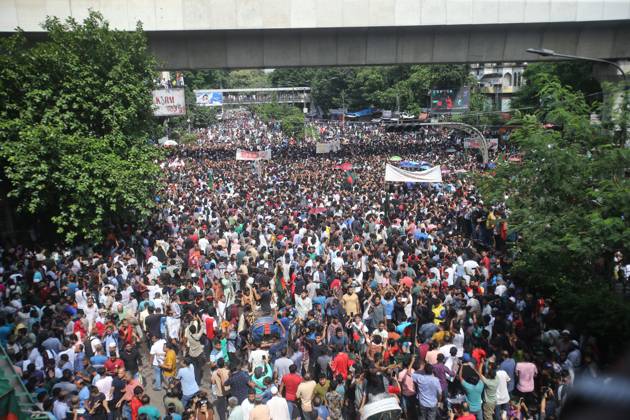 August 5, 2024, Dhaka, Wari, Bangladesh: Anti-government protestors celebrate in Shahbag near Dhaka university area in Dhaka on August 5, 2024. Protests in Bangladesh that began as student-led demonstrations against government hiring rules in July culminated on August 5, in the prime minister fleeing and the military announcing it would form an interim government.People gather to celebrate the fall of Bangladesh Prime Minister Sheikh Hasina after an intense clash between police, pro-government forces, and anti-Quota protesters in Dhaka, Bangladesh. Dhaka Bangladesh - ZUMAr336 20240805_zip_r336_063 Copyright: xHabiburxRahmanx