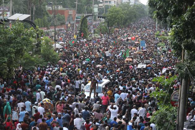 August 5, 2024, Dhaka, Wari, Bangladesh: Anti-government protestors celebrate in Shahbag near Dhaka university area in Dhaka on August 5, 2024. Protests in Bangladesh that began as student-led demonstrations against government hiring rules in July culminated on August 5, in the prime minister fleeing and the military announcing it would form an interim government.People gather to celebrate the fall of Bangladesh Prime Minister Sheikh Hasina after an intense clash between police, pro-government forces, and anti-Quota protesters in Dhaka, Bangladesh. Dhaka Bangladesh - ZUMAr336 20240805_zip_r336_066 Copyright: xHabiburxRahmanx