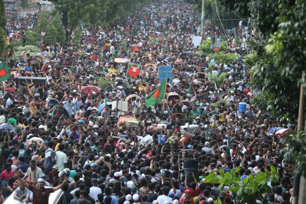 August 5, 2024, Dhaka, Wari, Bangladesh: Anti-government protestors celebrate in Shahbag near Dhaka university area in Dhaka on August 5, 2024. Protests in Bangladesh that began as student-led demonstrations against government hiring rules in July culminated on August 5, in the prime minister fleeing and the military announcing it would form an interim government.People gather to celebrate the fall of Bangladesh Prime Minister Sheikh Hasina after an intense clash between police, pro-government forces, and anti-Quota protesters in Dhaka, Bangladesh. Dhaka Bangladesh - ZUMAr336 20240805_zip_r336_069 Copyright: xHabiburxRahmanx