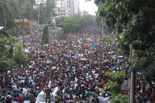 August 5, 2024, Dhaka, Wari, Bangladesh: Anti-government protestors celebrate in Shahbag near Dhaka university area in Dhaka on August 5, 2024. Protests in Bangladesh that began as student-led demonstrations against government hiring rules in July culminated on August 5, in the prime minister fleeing and the military announcing it would form an interim government.People gather to celebrate the fall of Bangladesh Prime Minister Sheikh Hasina after an intense clash between police, pro-government forces, and anti-Quota protesters in Dhaka, Bangladesh. Dhaka Bangladesh - ZUMAr336 20240805_zip_r336_073 Copyright: xHabiburxRahmanx