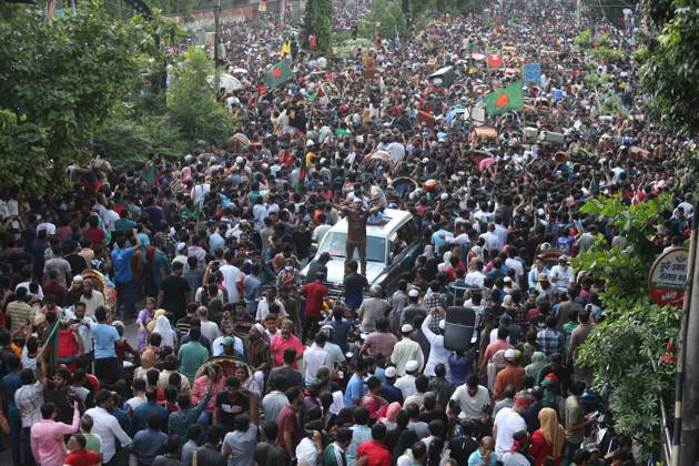 August 5, 2024, Dhaka, Wari, Bangladesh: Anti-government protestors celebrate in Shahbag near Dhaka university area in Dhaka on August 5, 2024. Protests in Bangladesh that began as student-led demonstrations against government hiring rules in July culminated on August 5, in the prime minister fleeing and the military announcing it would form an interim government.People gather to celebrate the fall of Bangladesh Prime Minister Sheikh Hasina after an intense clash between police, pro-government forces, and anti-Quota protesters in Dhaka, Bangladesh. Dhaka Bangladesh - ZUMAr336 20240805_zip_r336_076 Copyright: xHabiburxRahmanx