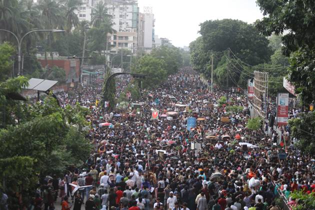 August 5, 2024, Dhaka, Wari, Bangladesh: Anti-government protestors celebrate in Shahbag near Dhaka university area in Dhaka on August 5, 2024. Protests in Bangladesh that began as student-led demonstrations against government hiring rules in July culminated on August 5, in the prime minister fleeing and the military announcing it would form an interim government.People gather to celebrate the fall of Bangladesh Prime Minister Sheikh Hasina after an intense clash between police, pro-government forces, and anti-Quota protesters in Dhaka, Bangladesh. Dhaka Bangladesh - ZUMAr336 20240805_zip_r336_077 Copyright: xHabiburxRahmanx