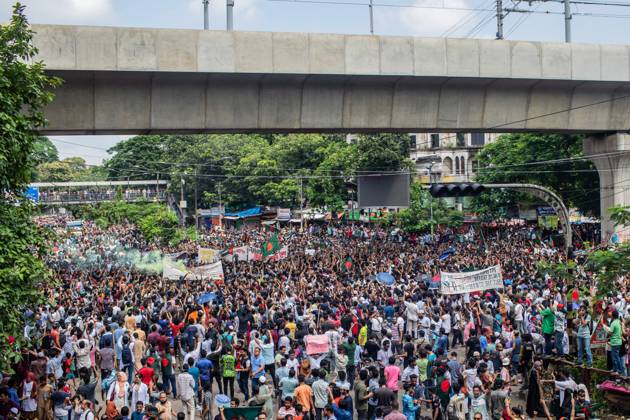 August 5, 2024, Dhaka, Bangladesh: Anti-government protestors participate in the celebrations. Thousands of people are celebrating the resignation of Bangladeshi Prime Minister Sheikh Hasina..Protests in Bangladesh that began as student-led demonstrations against government hiring rules in July culminated on August 5, in the prime minister fleeing and the military announcing it would form an interim government. Dhaka Bangladesh - ZUMAs197 20240805_aaa_s197_072 Copyright: xSazzadxHossainx