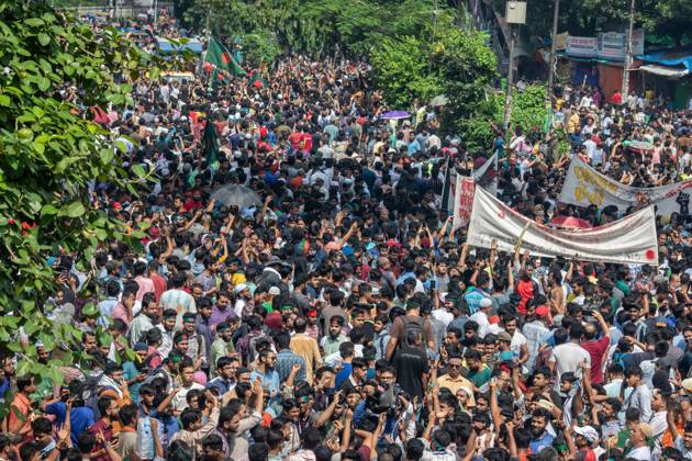 August 5, 2024, Dhaka, Bangladesh: Anti-government protestors participate in the celebrations. Thousands of people are celebrating the resignation of Bangladeshi Prime Minister Sheikh Hasina..Protests in Bangladesh that began as student-led demonstrations against government hiring rules in July culminated on August 5, in the prime minister fleeing and the military announcing it would form an interim government. Dhaka Bangladesh - ZUMAs197 20240805_aaa_s197_074 Copyright: xSazzadxHossainx