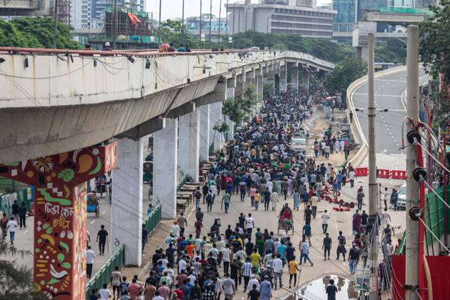 August 5, 2024, Dhaka, Bangladesh: Anti-government protestors participate in the celebrations. Thousands of people are celebrating the resignation of Bangladeshi Prime Minister Sheikh Hasina..Protests in Bangladesh that began as student-led demonstrations against government hiring rules in July culminated on August 5, in the prime minister fleeing and the military announcing it would form an interim government. Dhaka Bangladesh - ZUMAs197 20240805_aaa_s197_085 Copyright: xSazzadxHossainx