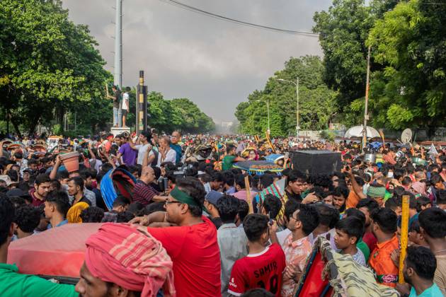 August 5, 2024, Dhaka, Bangladesh: Anti-government protestors march on the street during the celebrations. Thousands of People celebrate the resignation of Bangladeshi Prime Minister Sheikh Hasina..Protests in Bangladesh that began as student-led demonstrations against government hiring rules in July culminated on August 5, in the prime minister fleeing and the military announcing it would form an interim government. Dhaka Bangladesh - ZUMAs197 20240805_aaa_s197_090 Copyright: xSazzadxHossainx