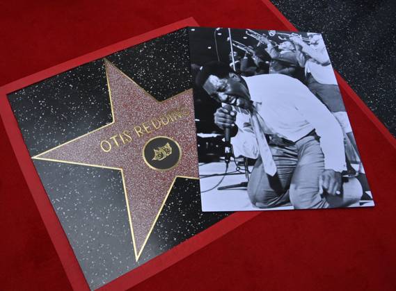 A photo of singer songwriter Otis Redding lies on his star during a posthumous unveiling ceremony honoring the late entertainer with the 2,791st star on the Hollywood Walk of Fame on Friday, October 4, 2024.  LAP2024100405 JIMxRUYMEN