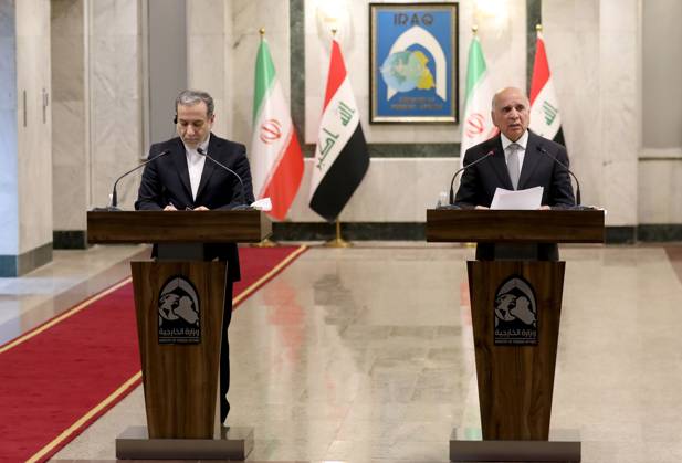News Bilder des Tages Bagdad, Fuad Hussein und Sejjed Araghtschi Pressekonferenz (241014) -- BAGHDAD, Oct. 14, 2024 -- Iraqi Foreign Minister Fuad Hussein (R) and Iranian Foreign Minister Seyyed Abbas Araghchi attend a joint press conference in Baghdad, Iraq, Oct. 13, 2024. Iraqi Prime Minister Mohammed Shia al-Sudani said Sunday that Iraq works to seek a ceasefire and prevent the expansion of the conflict in the Middle East. Al-Sudani made the remarks during his meeting with visiting Iranian Foreign Minister Seyyed Abbas Araghchi and his accompanying delegation, according to a statement issued by al-Sudani s media office. ) IRAQ-BAGHDAD-IRANIAN FM-VISIT KhalilxDawood 