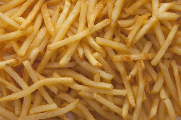 Pile of French fries Salt Lake City,Utah,USA, 04.01.2010, TTBB_ti3601139.jpg, Appetite, Background, Chips, Cholesterol, Comfort Food, Crave, Craving, Fast Food, Fat, Fatning, Fatty Food, Food, French Fries, Fried, Fried Food, Fries, Full Frame, Horizontal, Junk Food, No People, Obesity, Pile, Temptation, Unhealthy, Unhealthy Diet, Unhealthy Food Copyright: xMikexKempx