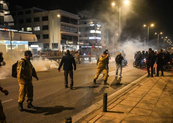 Police use tear gas to disperse Greece s firefighters demanding permanent jobs Firefighters run away as tear gas exploding amidst clashes that erupted between Seasonal Firefighters and Police ahead of the Ministry of Climate Crisis and Civil Protection during a protest to demand permanent positions amid hotter summers and worsening wildfires. Athens Greece Copyright: DimitrisxAspiotis