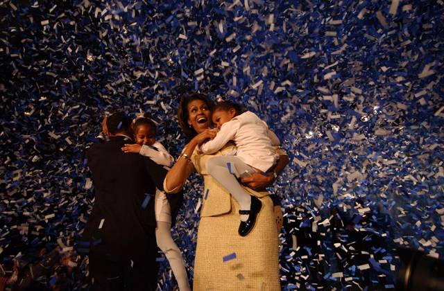 Michelle Obama U.S. Senator-elect Barack Obama, with daughter Malia, wife Michelle and daughter Sasha, wave to supporters at his victory celebration Nov. 2, 2004 at the at the Hyatt Regency Hotel in Chicago. (Jason Wambsgans Chicago Tribune TNS) Chicago IL USA EDITORIAL USE ONLY Copyright: xx 1160316 JasonxWambsgansx krtphotoslive704508