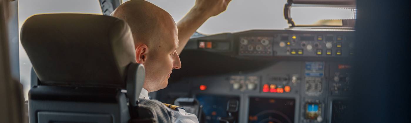 Focused professional pilot sitting in an airplane cabin, ready for takeoff. Aircraft, aircrew, occupation concept, model released, , 44601688.jpg, adult, adults, air, aircraft, airline, airliner, airplane, airport, attractive, auto pilot, aviator, background, boarding, business, cabin, cockpit, commercial, crew, flight, fly, focused, guy, horizontal, job, journey, landing, male, man, occupation, people, person, pilot, plane, preparing, professional, ready, real, service, simulator, sitting, takeoff, tourism, transport, transportation, travel, trip, uniform, work RECORD DATE NOT STATED